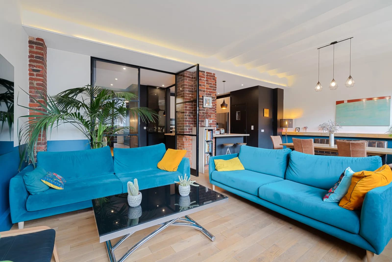 Salon dans Logement style loft à l'esprit industriel affirmé - 0