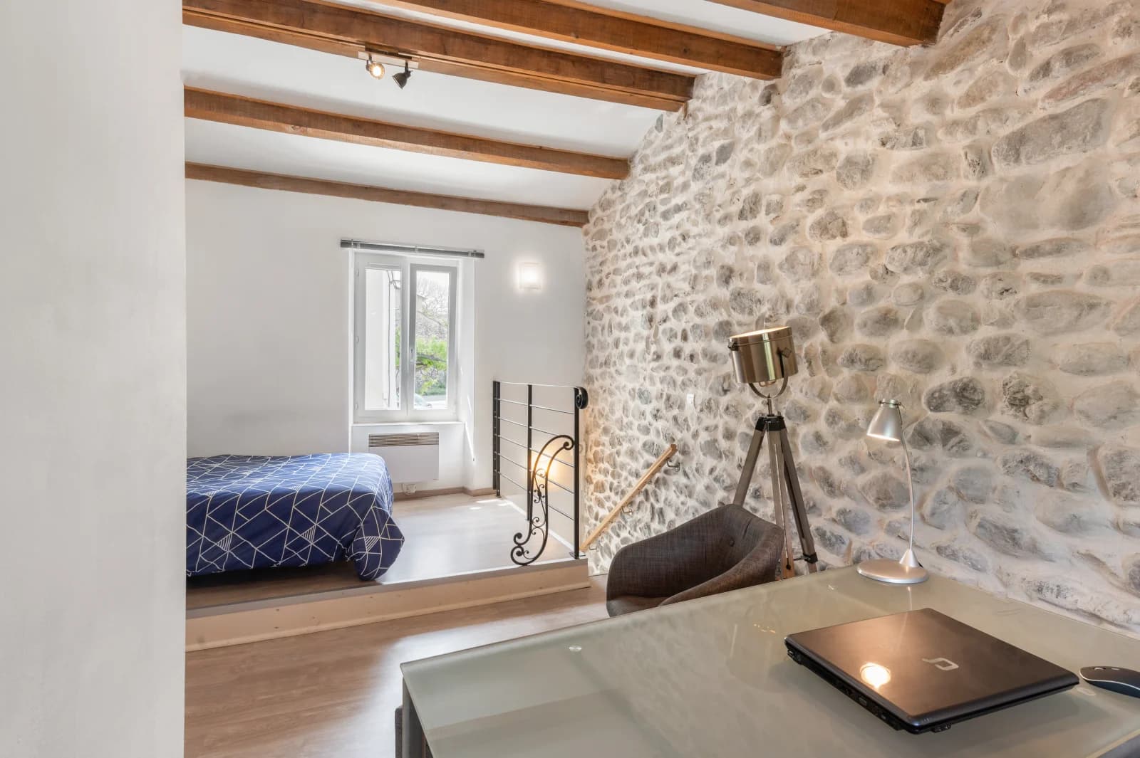 Living room in Cosy setting with exposed stone and beams - 1