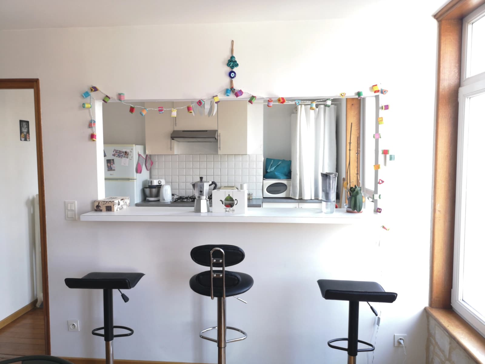 Cuisine dans Magnifique triplex aux volumes et au design exceptionnels - 1