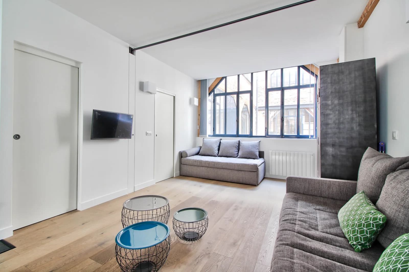 Salon dans Sloth Loft Montmartre: un havre de paix insolite - 1