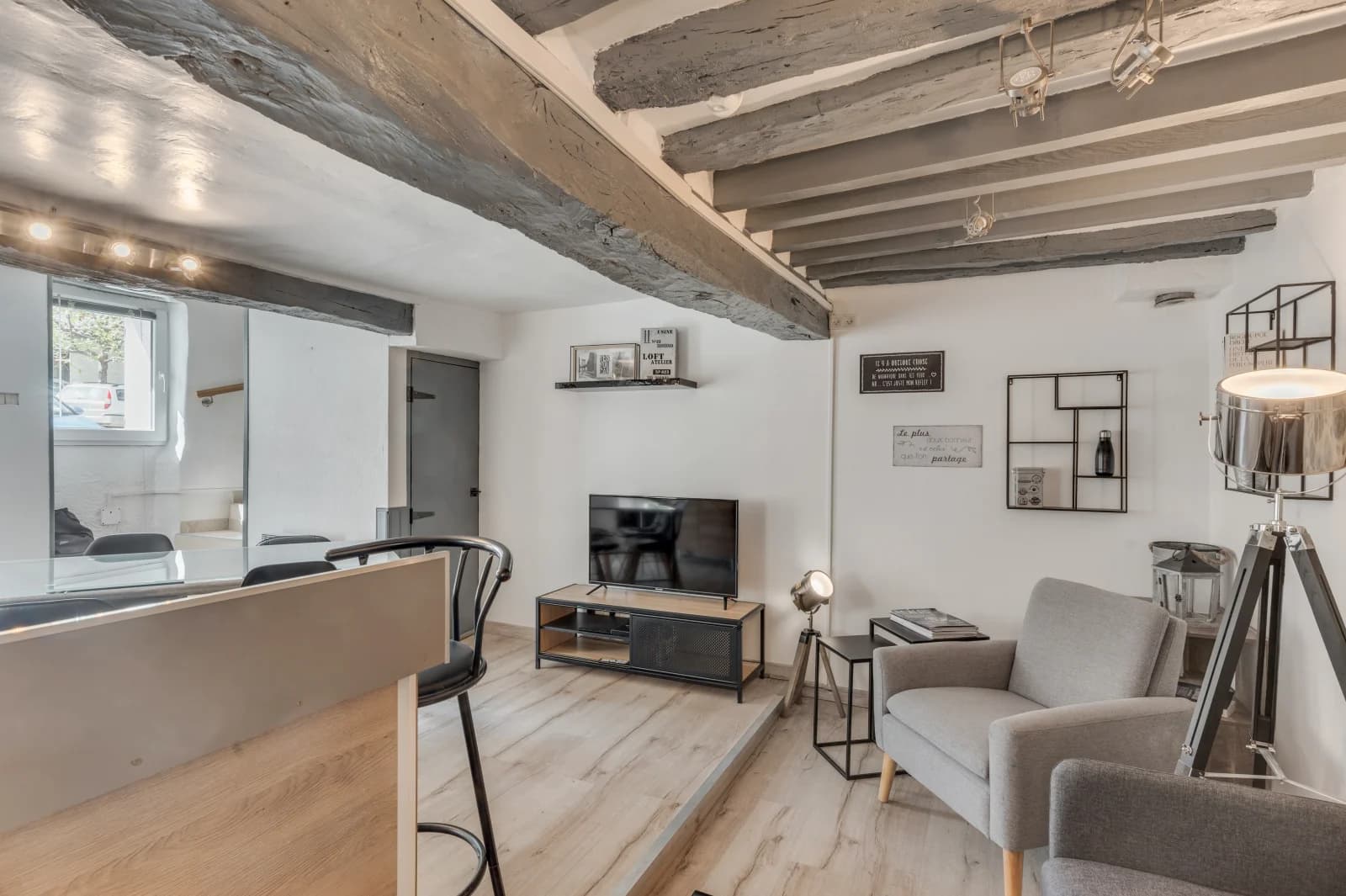 Living room in Cosy setting with exposed stone and beams - 1