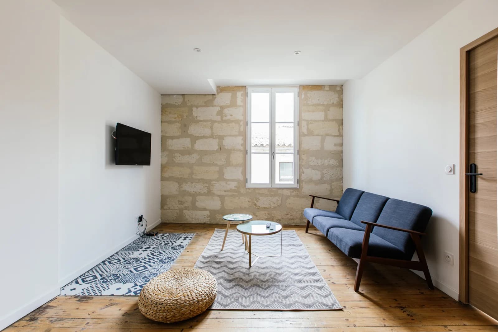 Living room in Bright, warm, exposed stone - 1