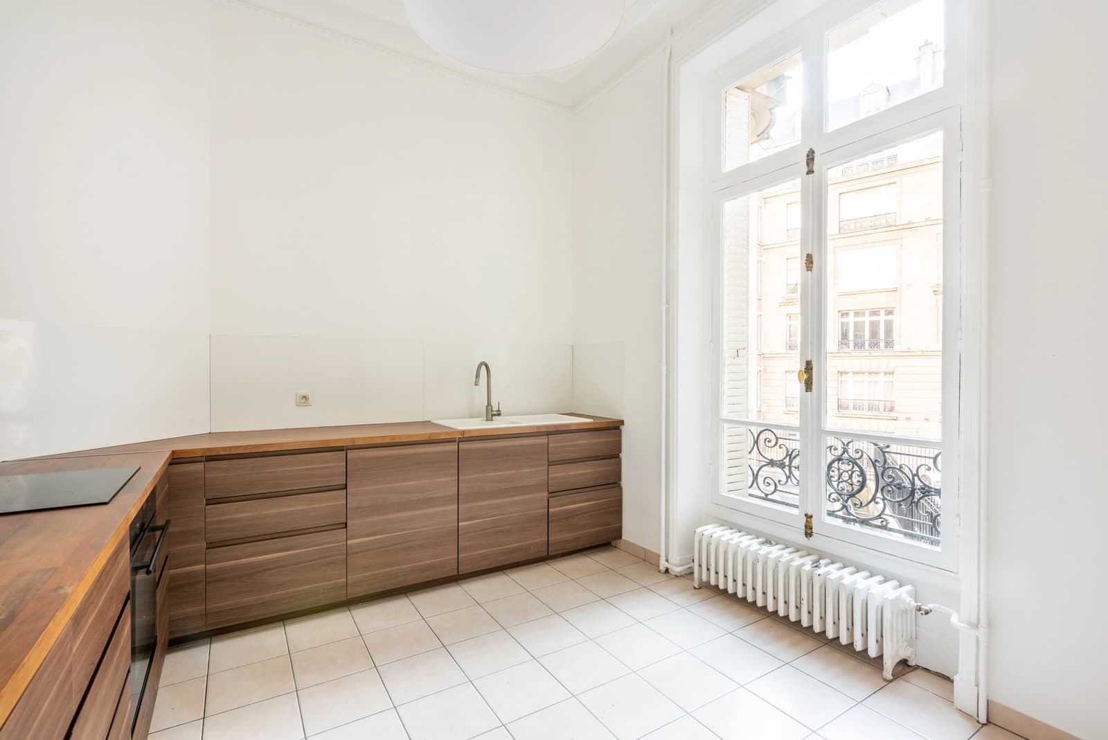 Space Sleek White Haussmannian Apartment at the Foot of the Arc de Triomphe - 5